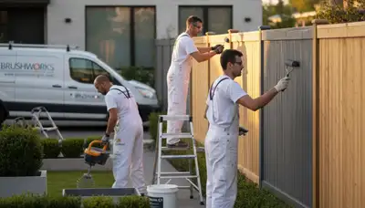Professional fence painting in Grand Rapids MI protecting wood fences from weather damage